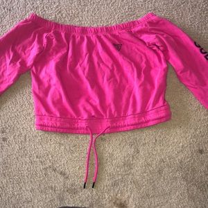 Large pink guess off the shoulder shirt